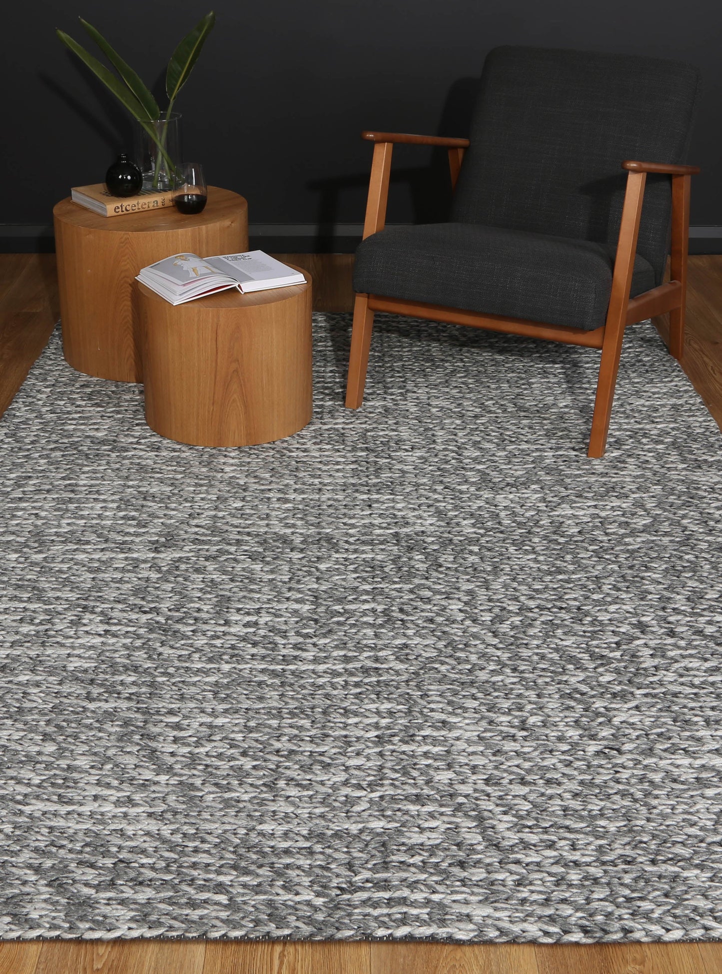 Wool blend tribal rug with playful Harlow Cue Charcoal design, perfect for childrens room.