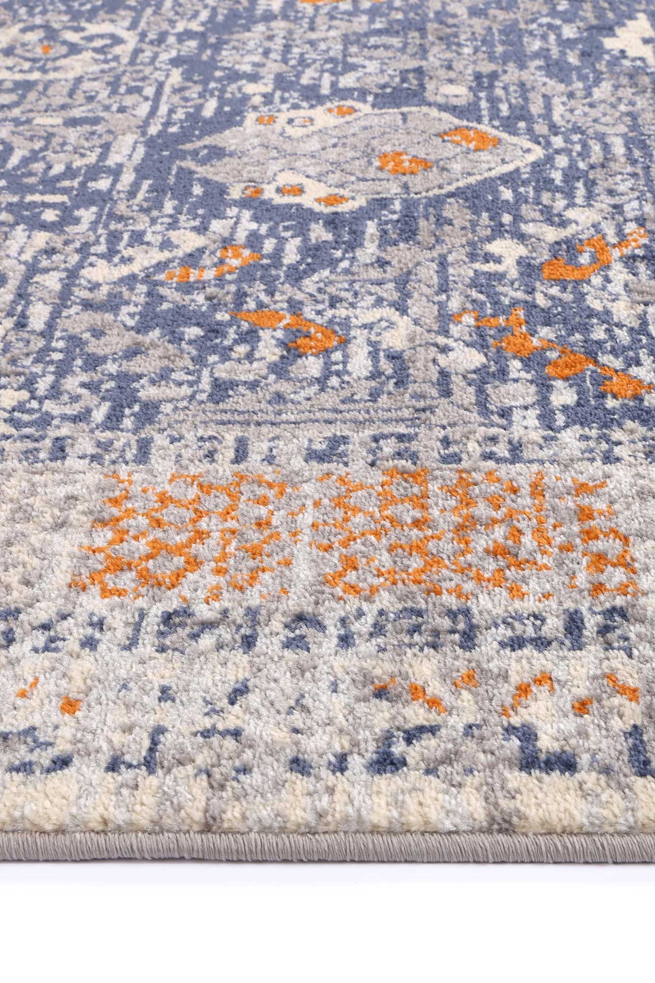 Bold geometric Inca rug in black and grey, ideal for adding style to childrens room.