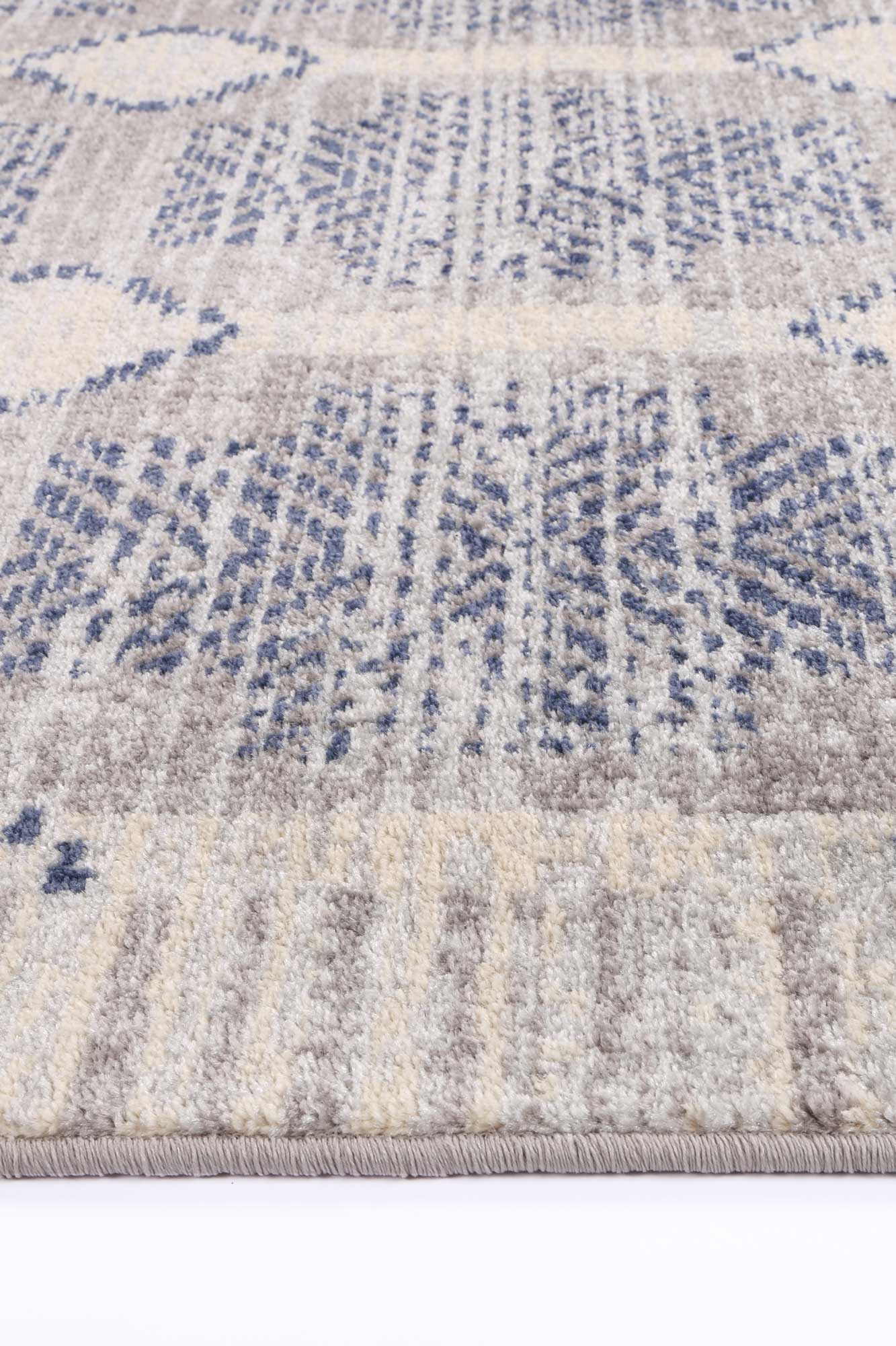 Large grey Inca geometric rug (240x330cm) with tribal design for childrens play area.