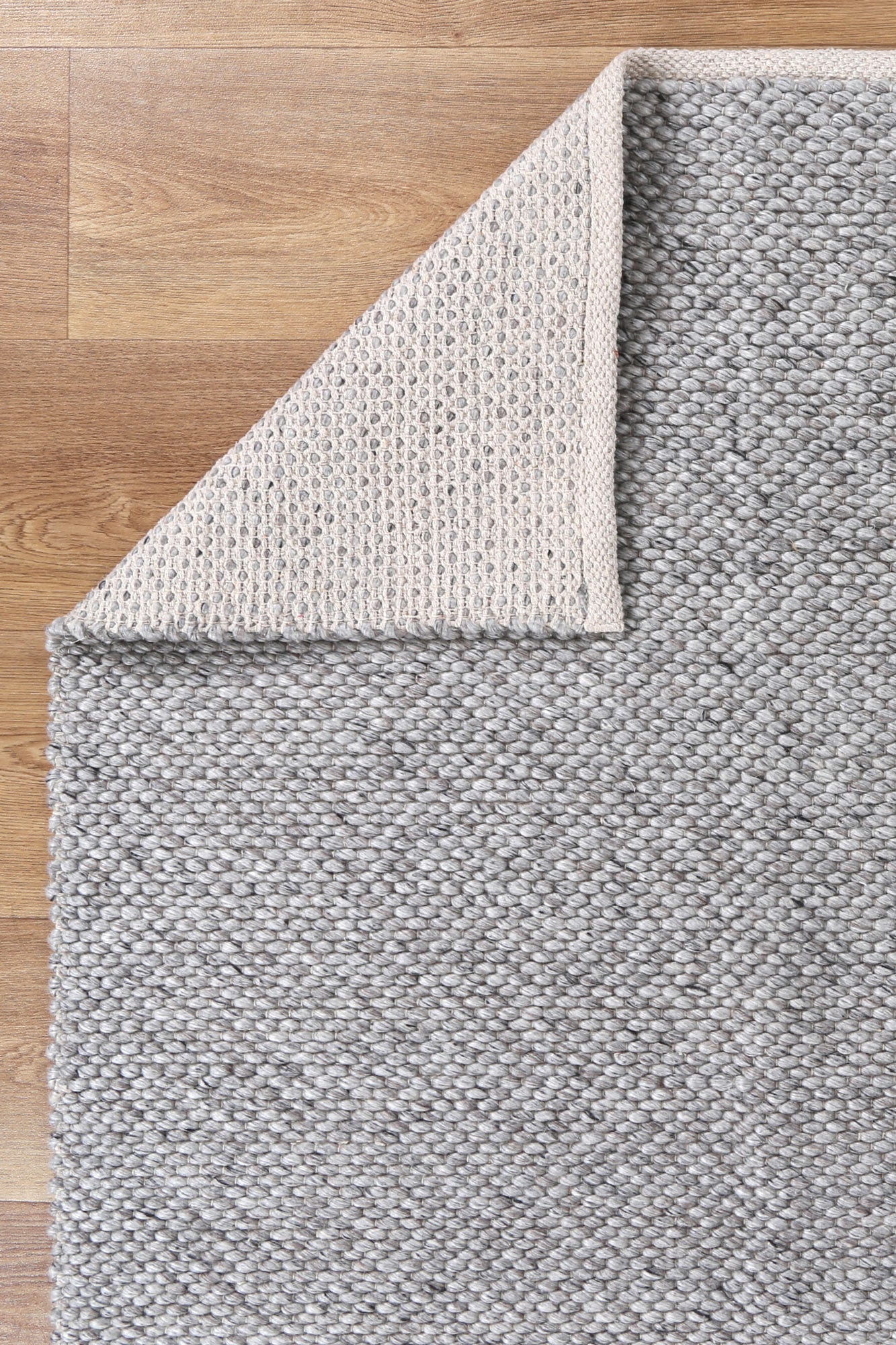 Tangier Grey Hand-Braided Wool Blend Rug 160x230cm perfect for cozy and playful childrens spaces.