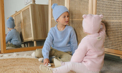 Adorable bear beanie hat for infants, featuring Love design, ideal for cozy winter wear.