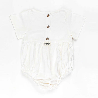 Ponchik Babies + Kids Linen Daisy Romper in size 2 years old, perfect for home play.