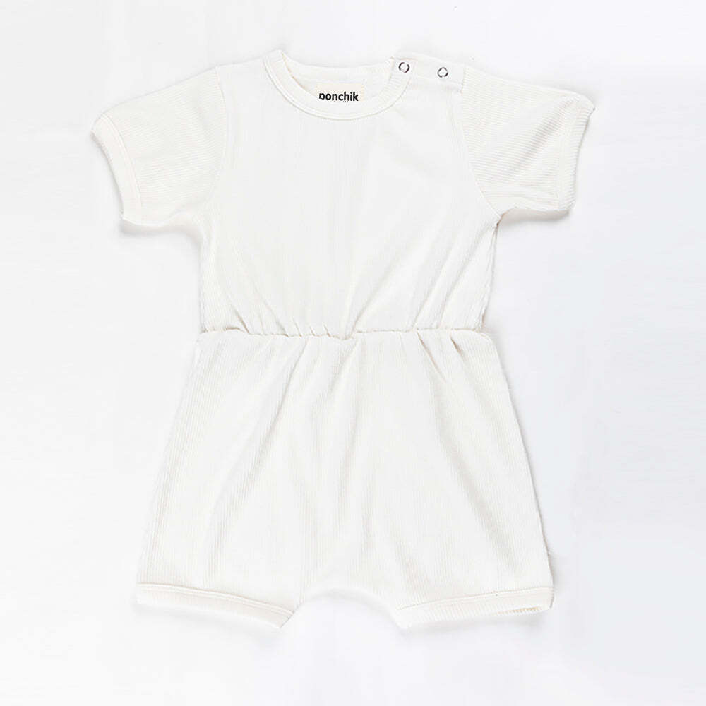 Ponchik Babies + Kids ribbed cotton romper in daisy print, perfect for infants.