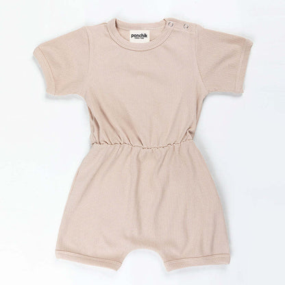 Ribbed cotton romper in sugar cookie color for 0-3 months, perfect for cozy lounging.