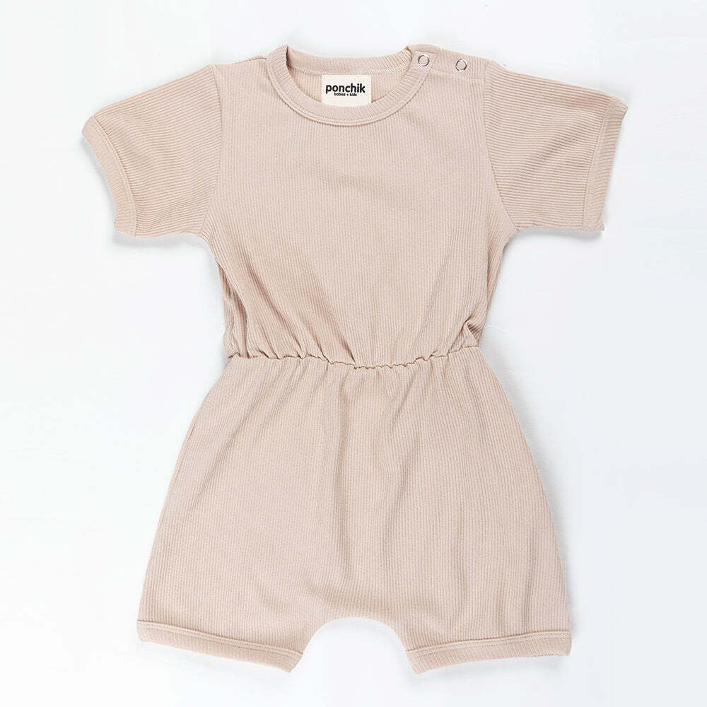Ponchik Babies + Kids ribbed cotton romper in sugar cookie for infants 0-3 months.