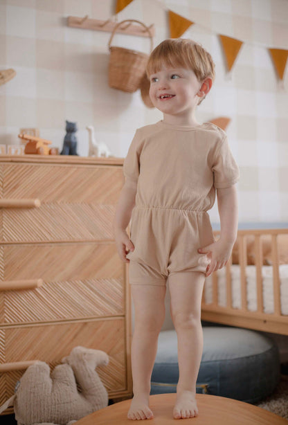Cute ribbed cotton romper in sugar cookie color for babies aged 3-6 months.