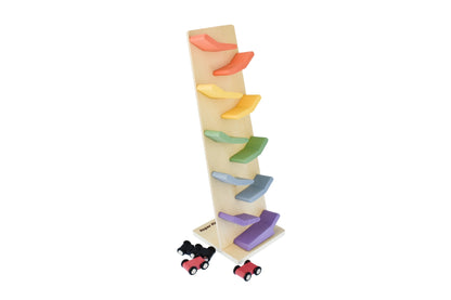 Colorful wooden car tower with rolling cars, ideal for imaginative play at home.