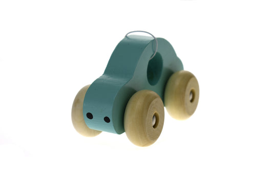 Kaper Kidz green wooden push toy car, perfect for toddlers imaginative play at home.