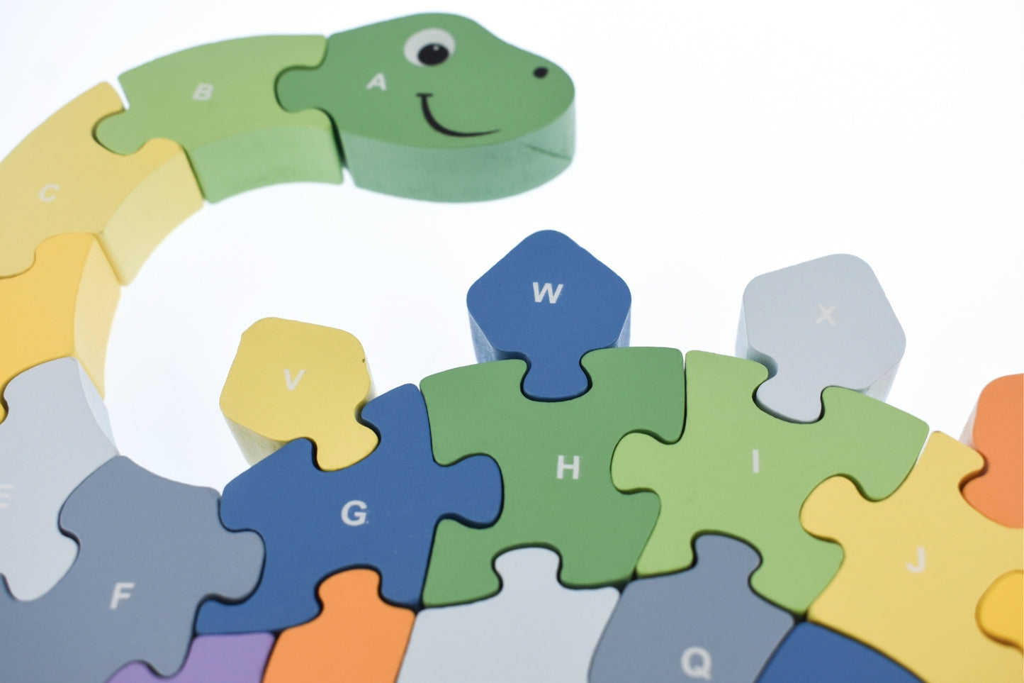 Educational A to Z dinosaur puzzle featuring chunky pieces for easy handling and prehistoric creatures.