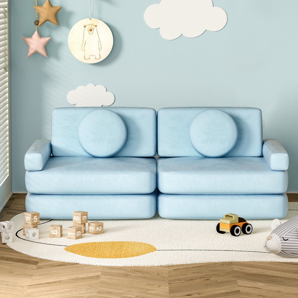 Kids blue velvet sofa bed with modular design for versatile play and relaxation.