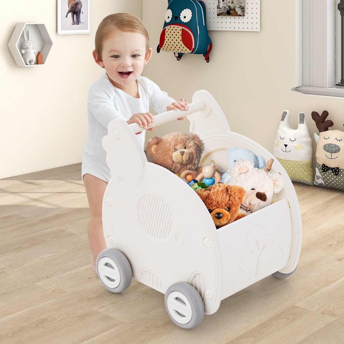 White elephant walker and shopping cart push toy for toddlers, combining play and mobility.