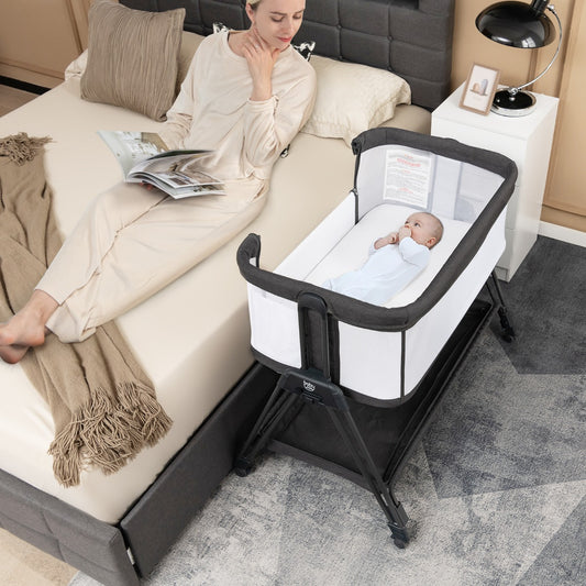 Portable baby bedside sleeper crib with adjustable 7 heights for versatile home use.