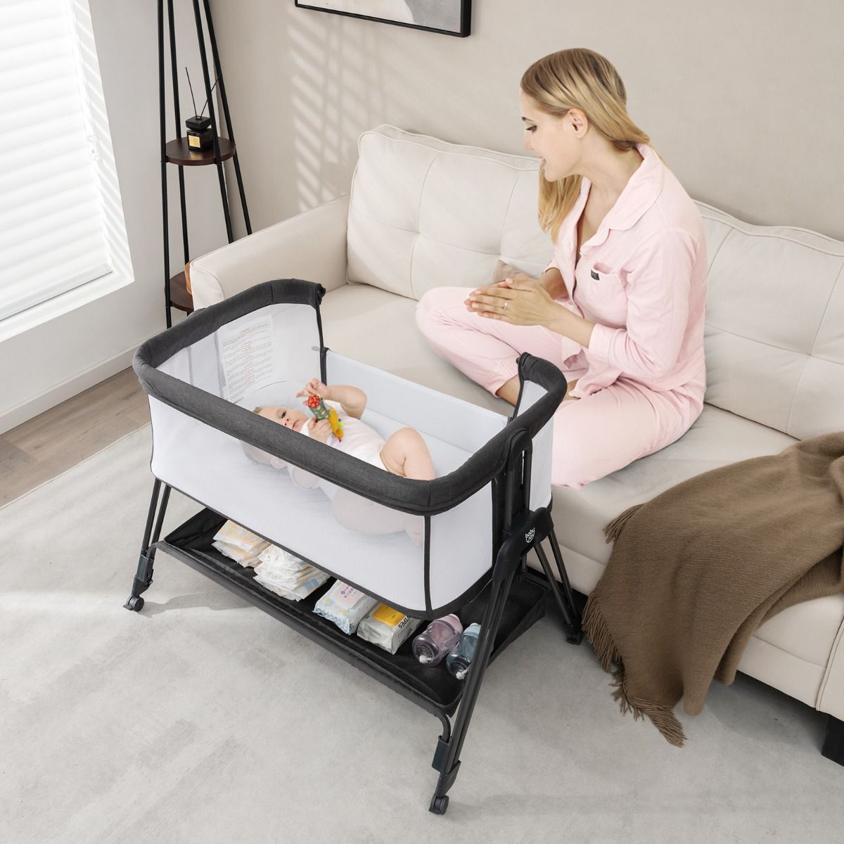 Versatile baby bedside sleeper crib with 7 adjustable heights for comfortable and safe sleep.