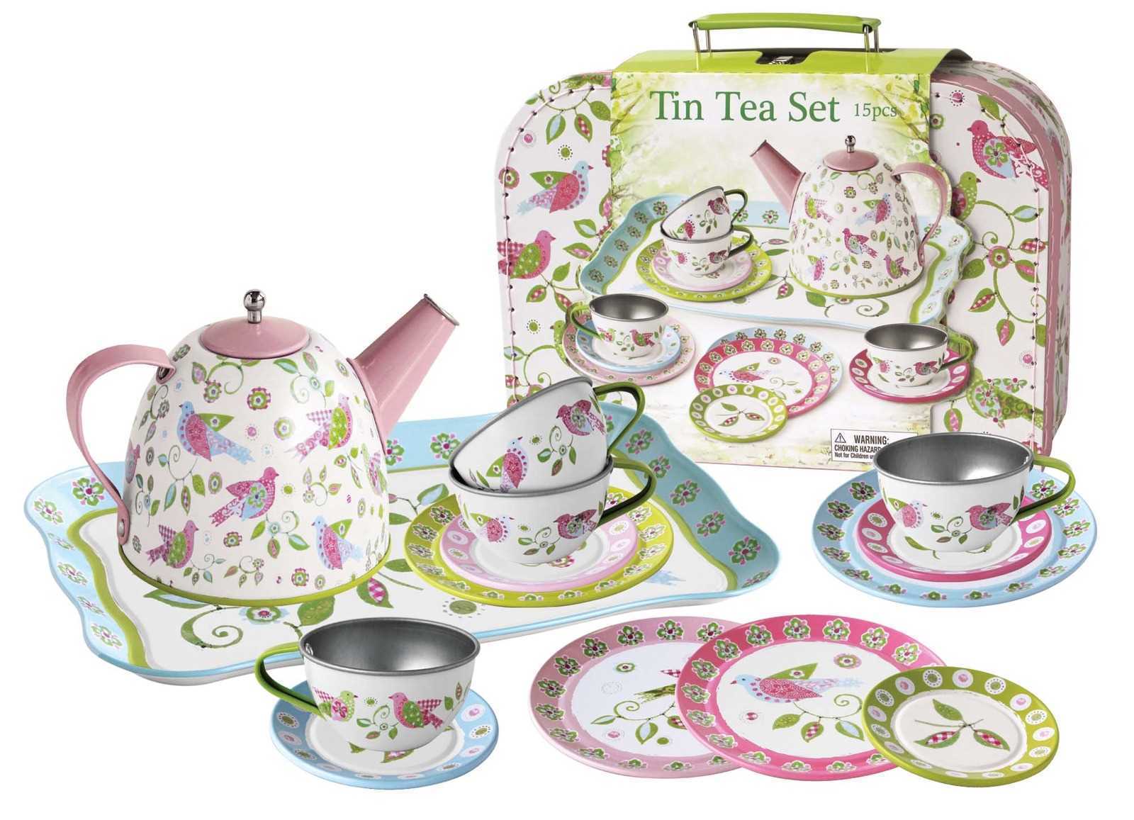 Cute bird-themed tin tea set in handy suitcase for imaginative play by kids.