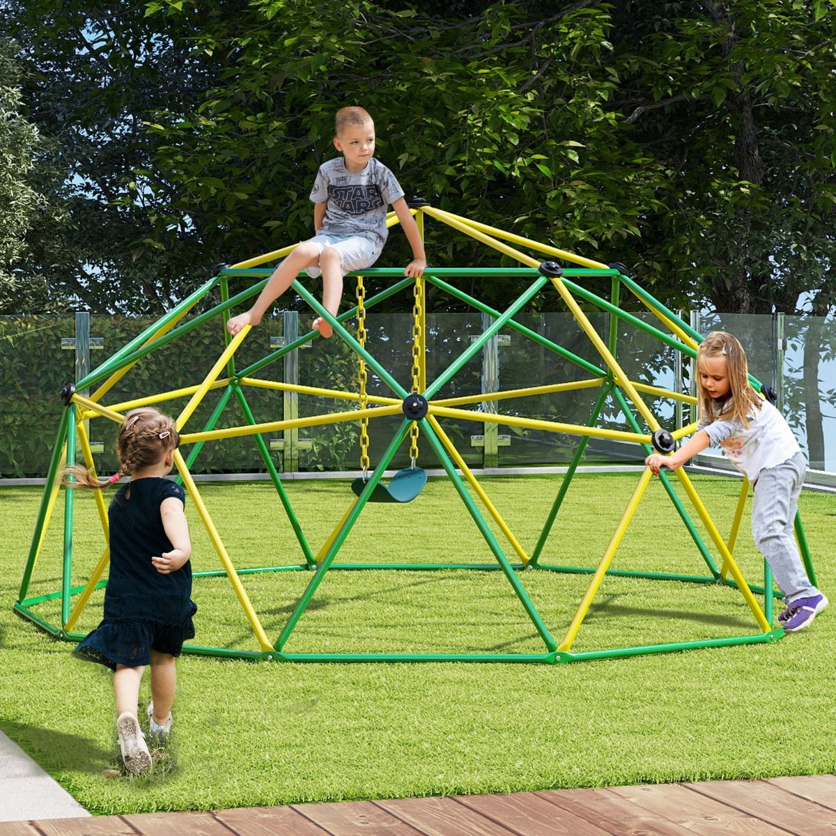 Green climbing dome playset with attached swing offers versatile outdoor fun and physical activity for children