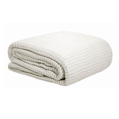 Soft white waffle blanket crafted in cozy cotton for kids beds comfort.