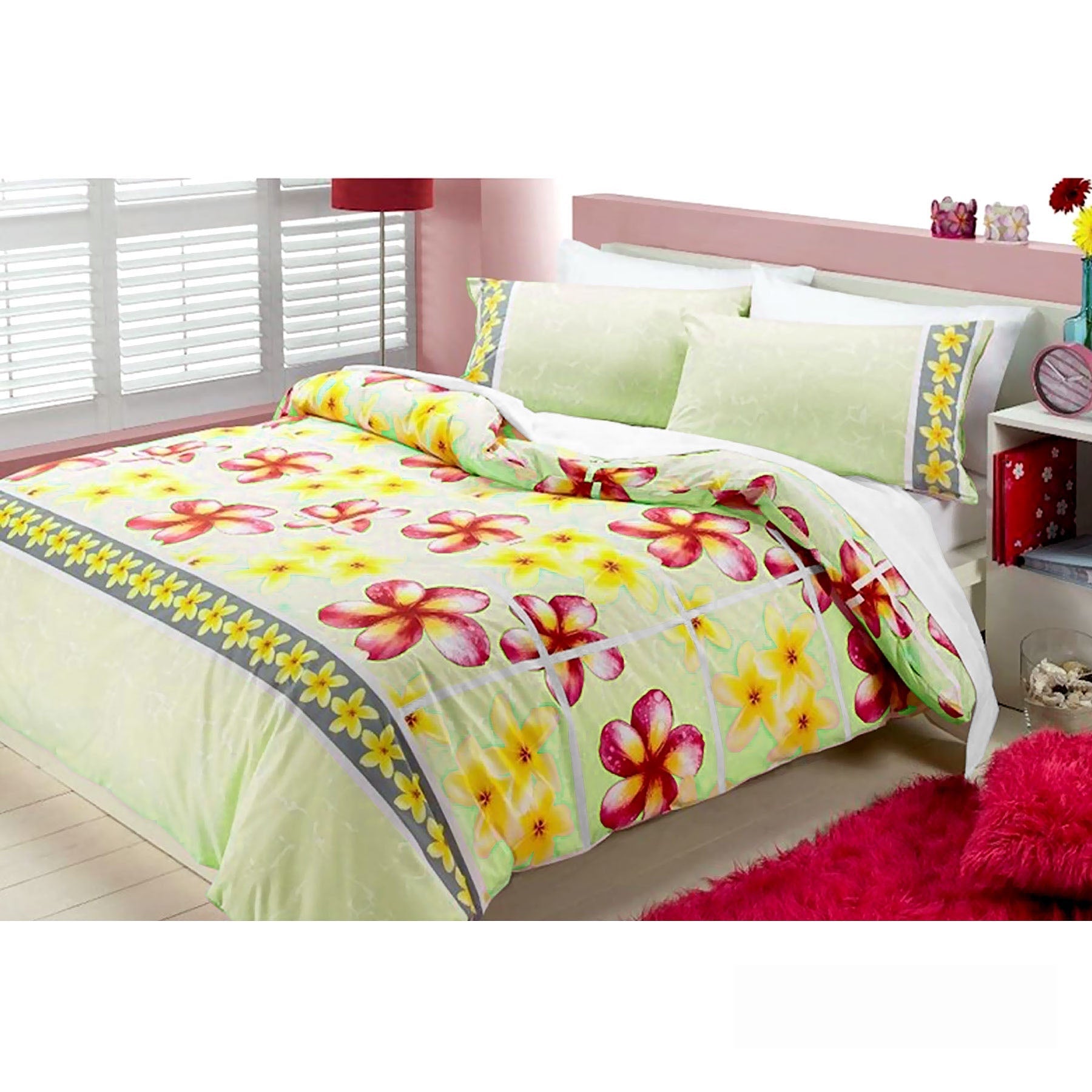 Kids quilt cover set with apple green floral frangipani design for single bed.