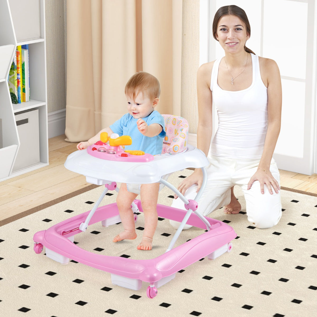 Pink baby walker with adjustable heights, music tray, and lights for active learning and play.