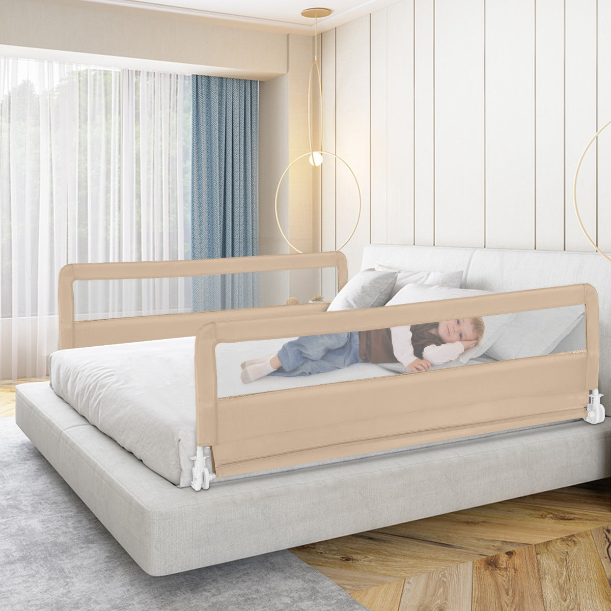 Foldable beige mesh bed rail with safety straps for toddlers, ideal for home use.