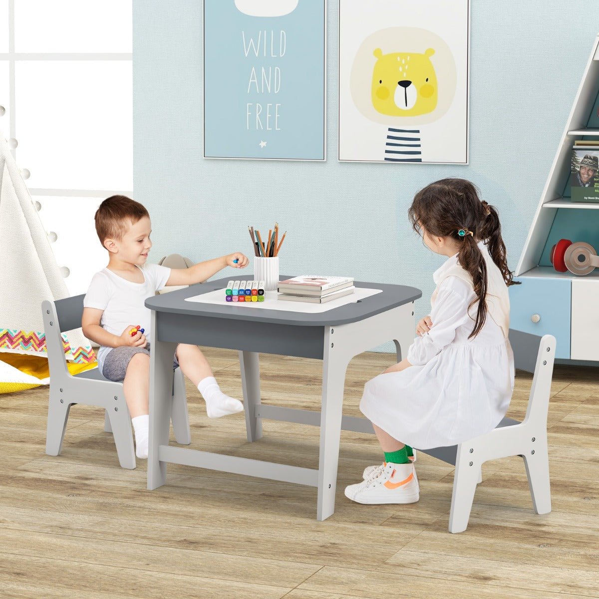 Kids activity table and chair set with storage in stylish grey/white design for home play.