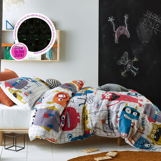 Colorful monster-themed double quilt cover set with glow-in-the-dark feature for kids room.