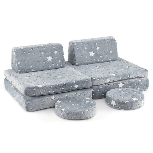 Grey modular play couch for kids features glow-in-the-dark patterns and soft flannel covers for imaginative playtime
