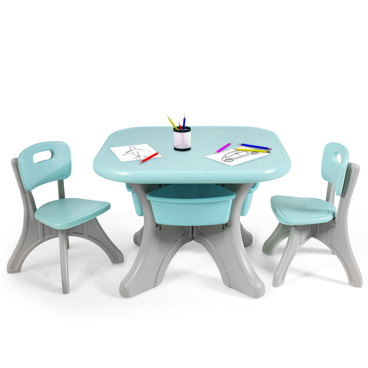 Green 3-piece playset with storage boxes for kids table and chair set at home.