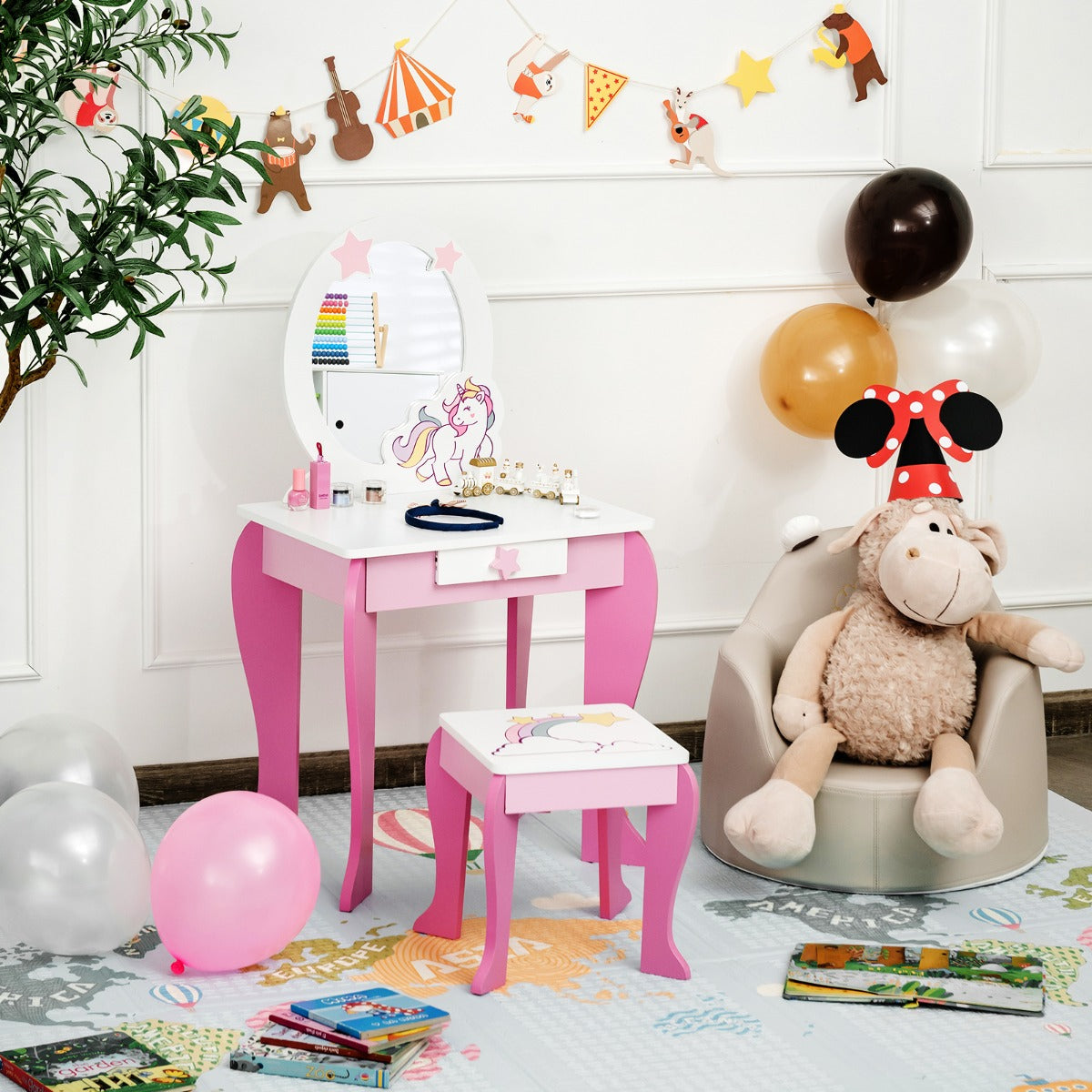 Kids pink unicorn vanity table set with mirror and stool for imaginative playtime.