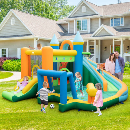 Inflatable water park featuring slides, climbing wall & blower for kids backyard fun.