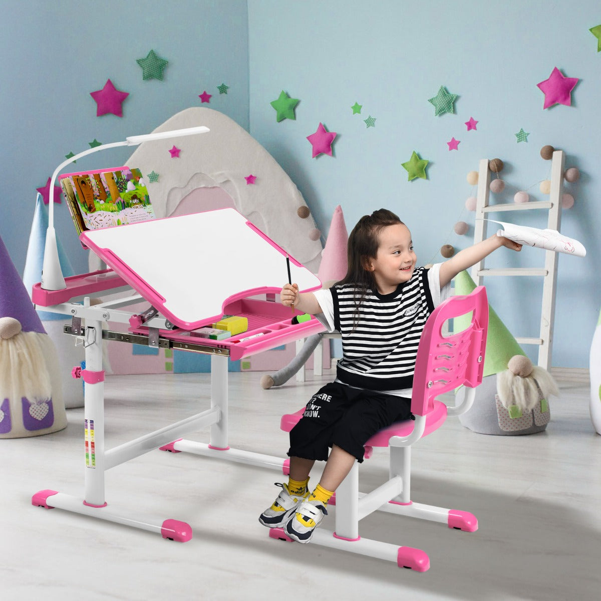 Kids study desk and chair set in pink with adjustable height and LED light.