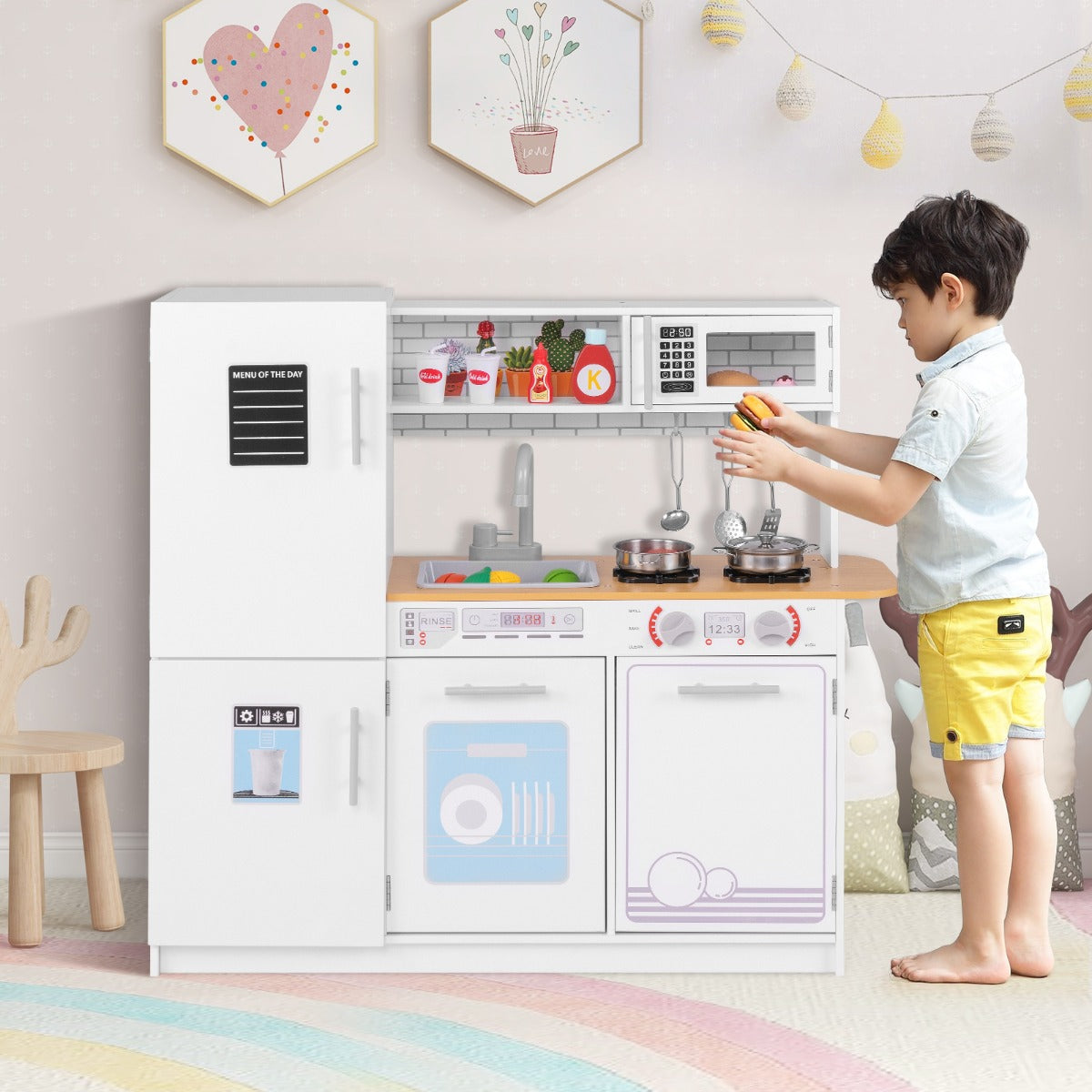 White childrens play kitchen featuring realistic stoves and a detachable sink for interactive cooking fun.