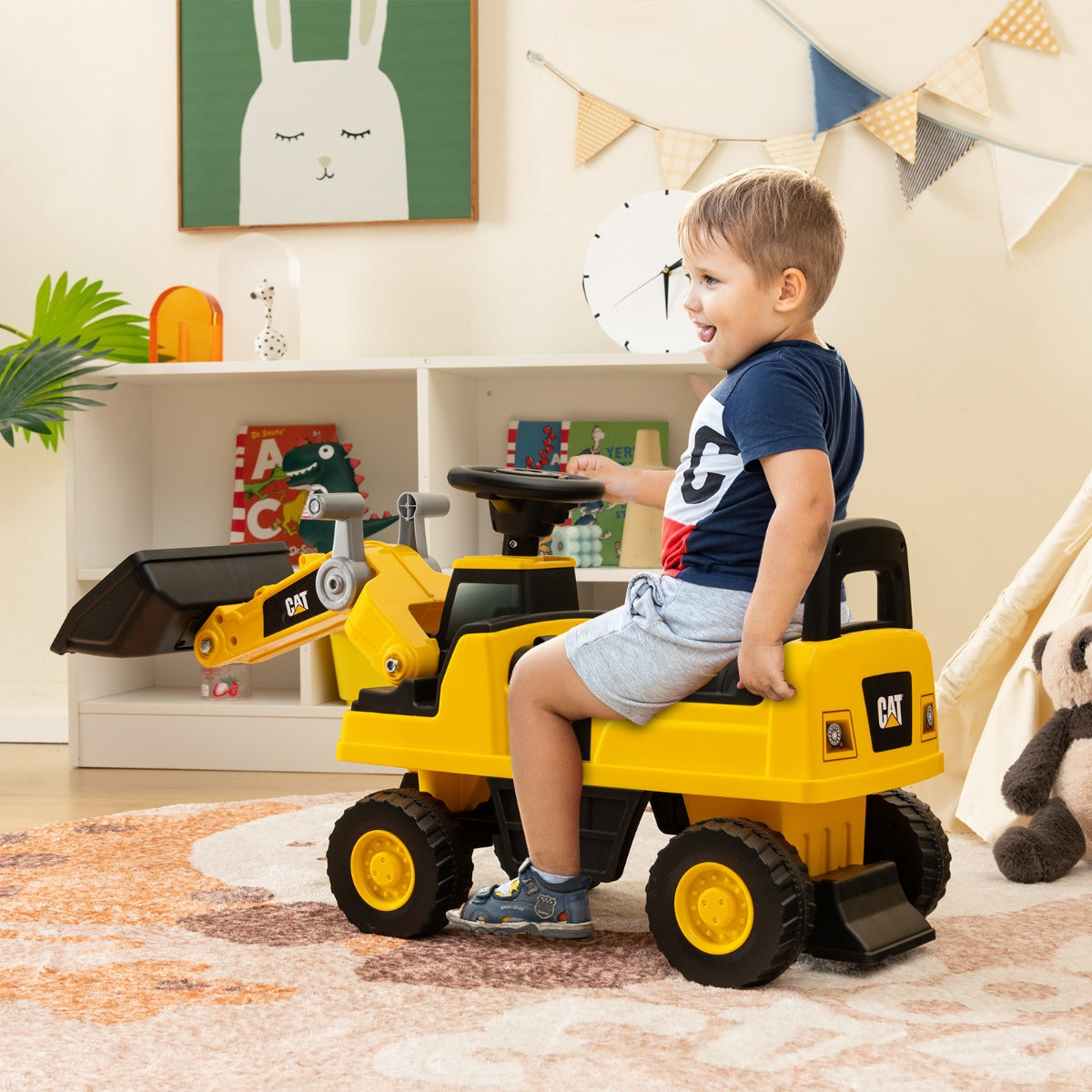 Yellow kids ride-on excavator bulldozer truck with realistic bucket for fun home digging play.