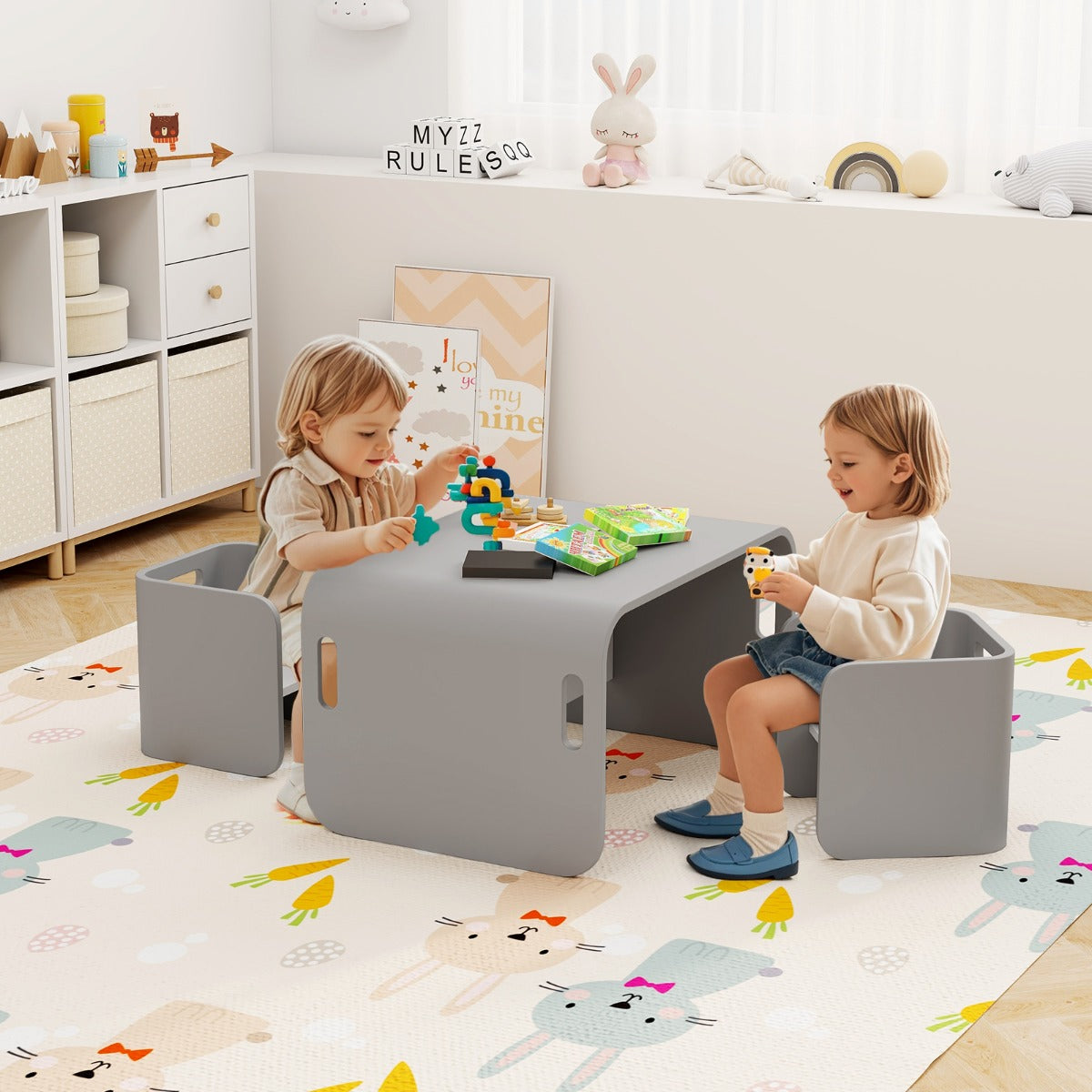 Stylish grey childrens table set with built-in storage shelves, crafted from durable birch wood for playtime and learning.