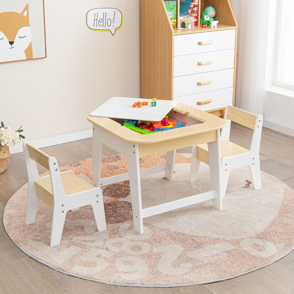 Kids table and chairs set with double-sided tabletop and storage for interactive play.