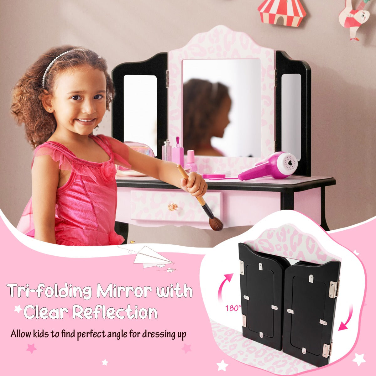 Kids vanity set in pink with snowflake design, includes mirror, drawer, and stool.