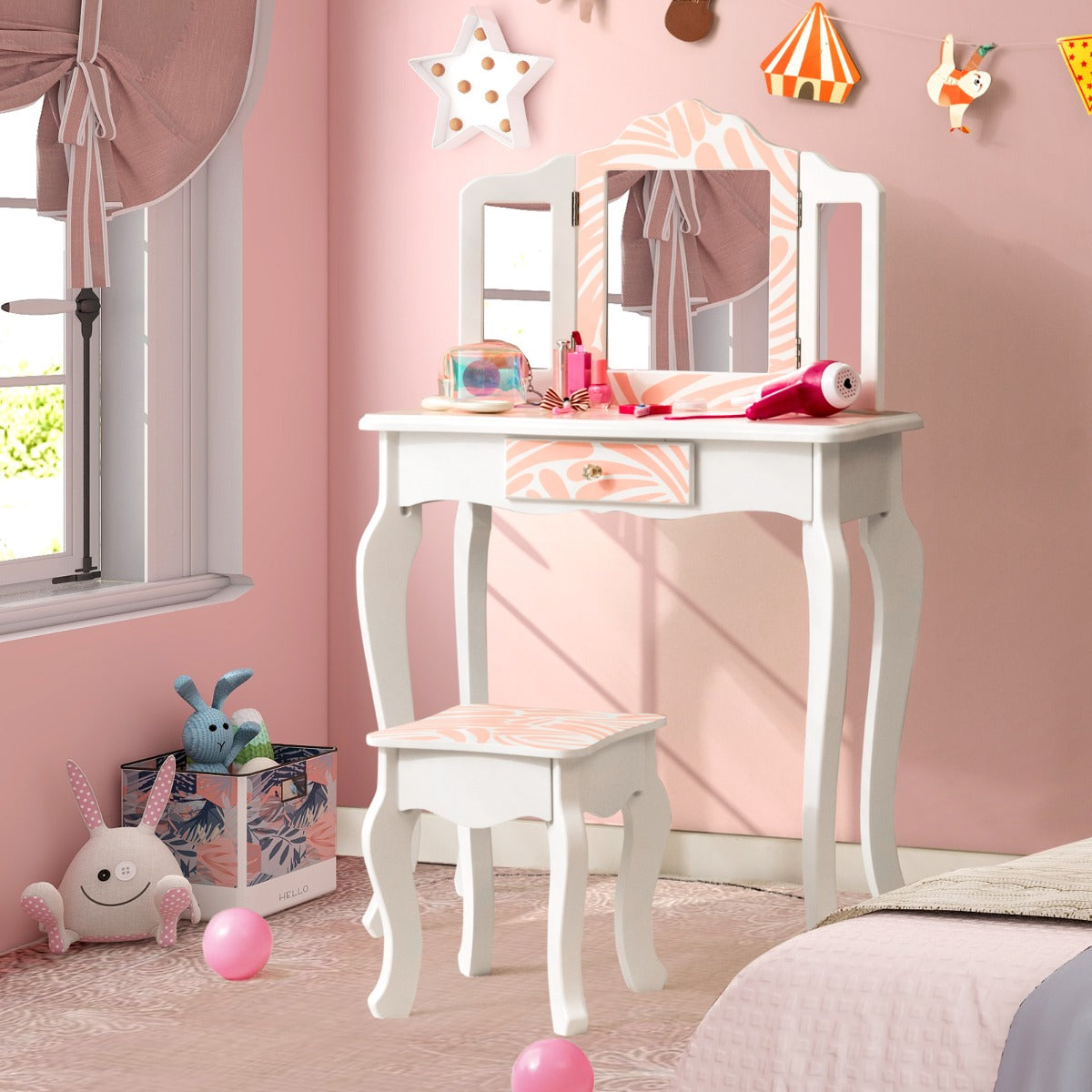 Kids pink snowflake vanity set with mirror and stool for girls bedroom decor.