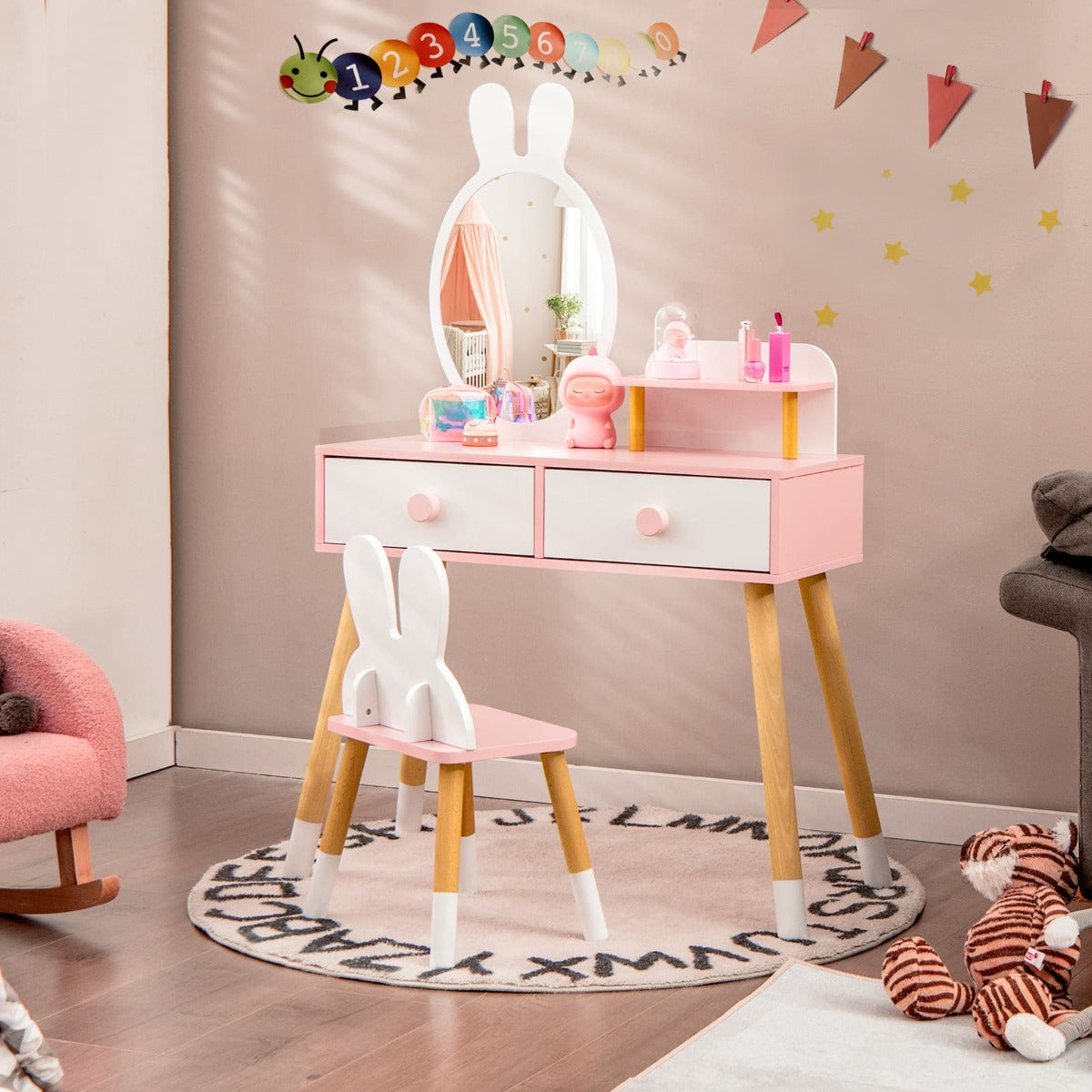 Childs pink and white vanity set with mirror and chair for toddlers and children.