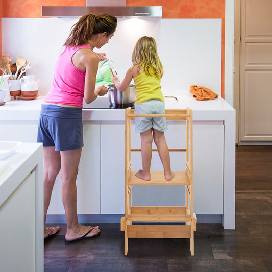 Height-adjustable bamboo toddler stool, perfect for kitchen helpers. Safe and stylish design for kids.