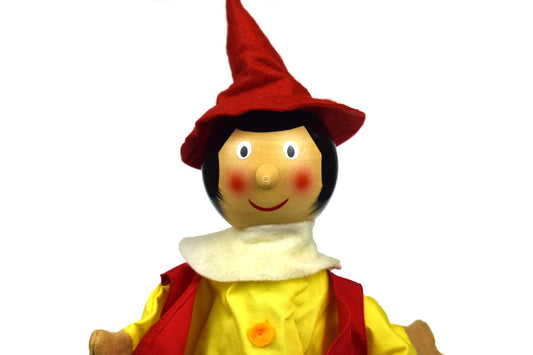 Colorful Pinocchio hand puppet toy for imaginative play, ideal for childrens entertainment at home.