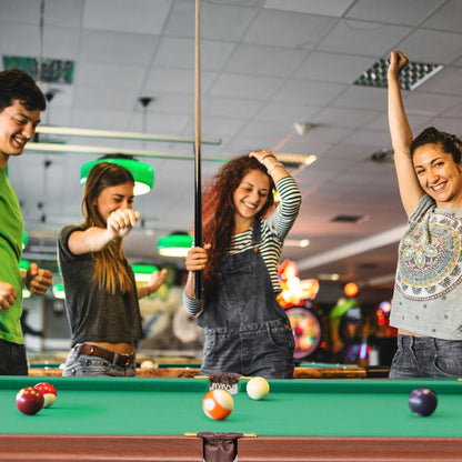 Compact folding pool table for kids game nights, ideal for family fun at home.