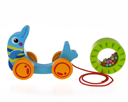 Colorful Pull Along Toy Dolphin for interactive play and motor skills development.