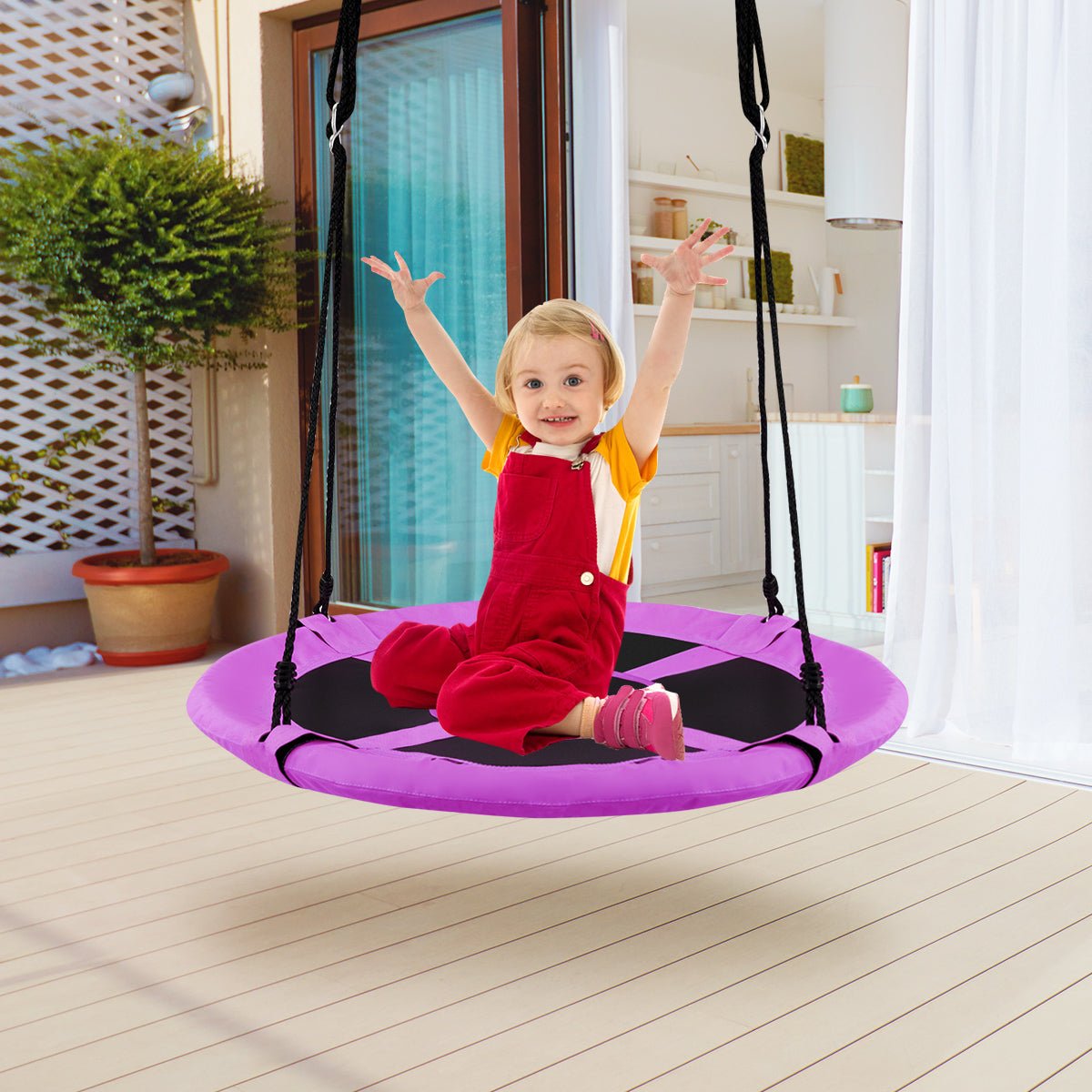 Purple flying saucer swing with giant 100cm seat for kids backyard fun.