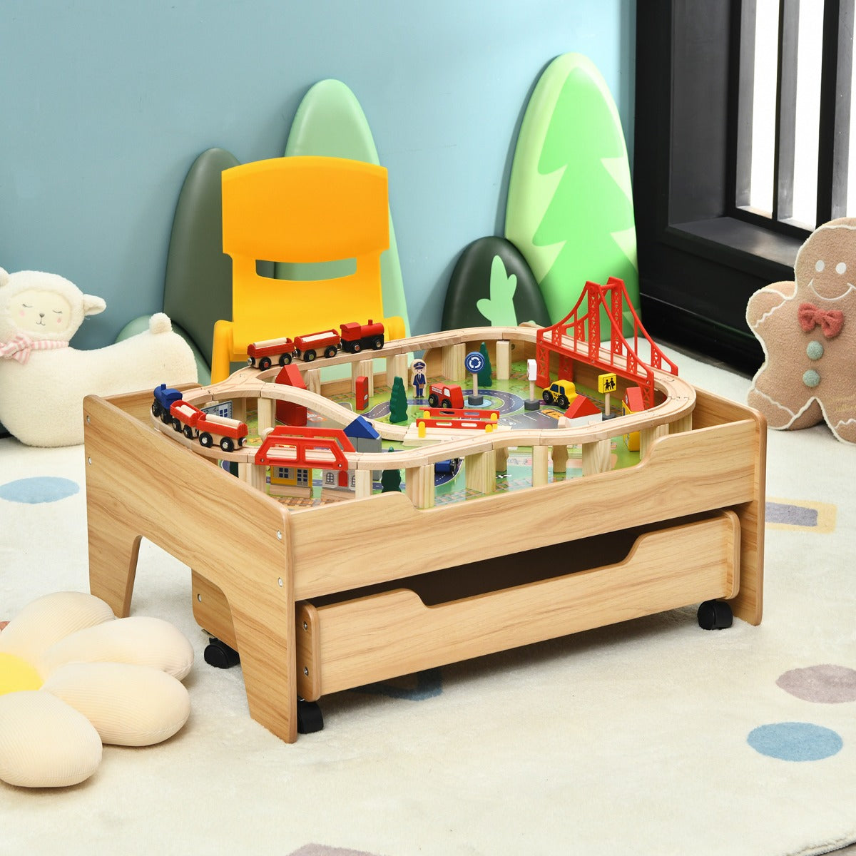 Wooden train table set with storage drawer; ideal for imaginative play at home.