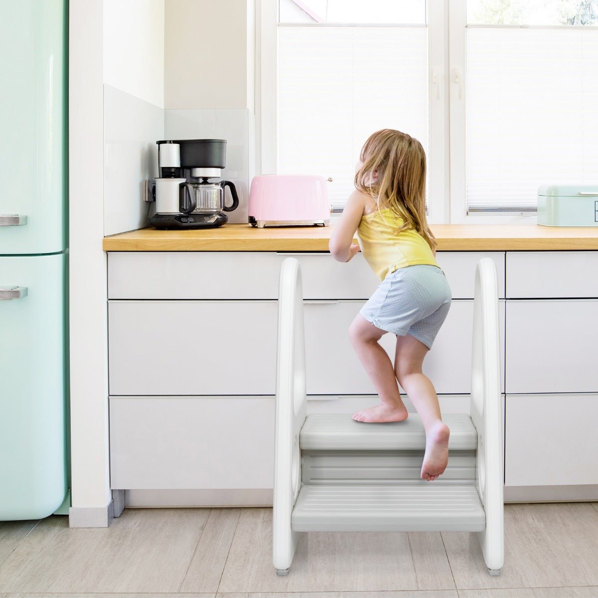 Grey toddler step stool and chair with anti-slip design for safe, versatile home use.