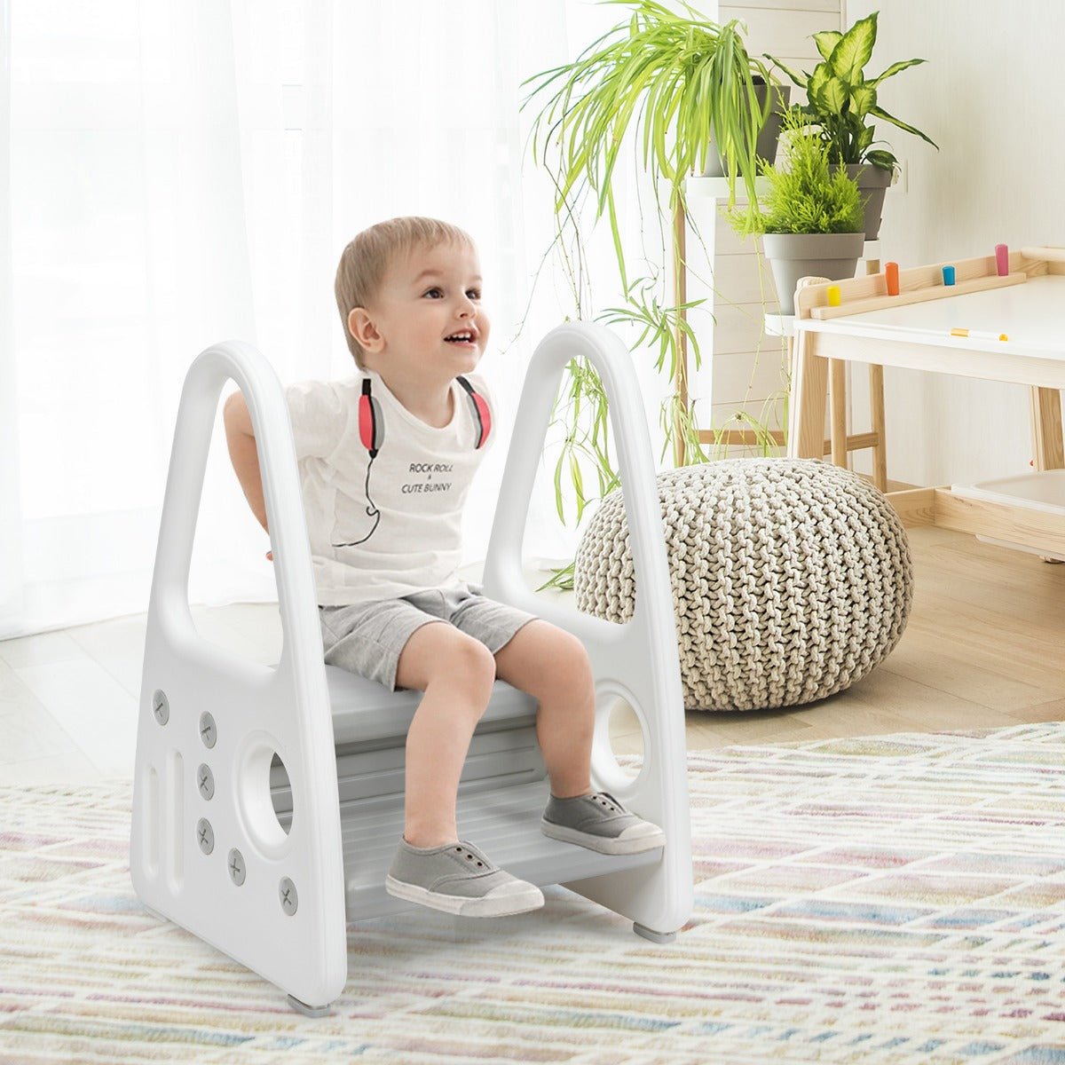 Grey toddler step stool and chair with dual levels for anti-slip safety, ideal for children.