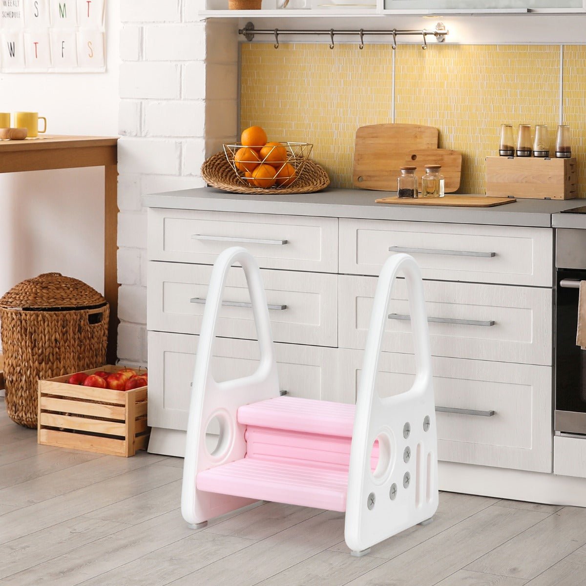 Pink toddler step stool with anti-slip surface, enhances kids independence and safety at home.