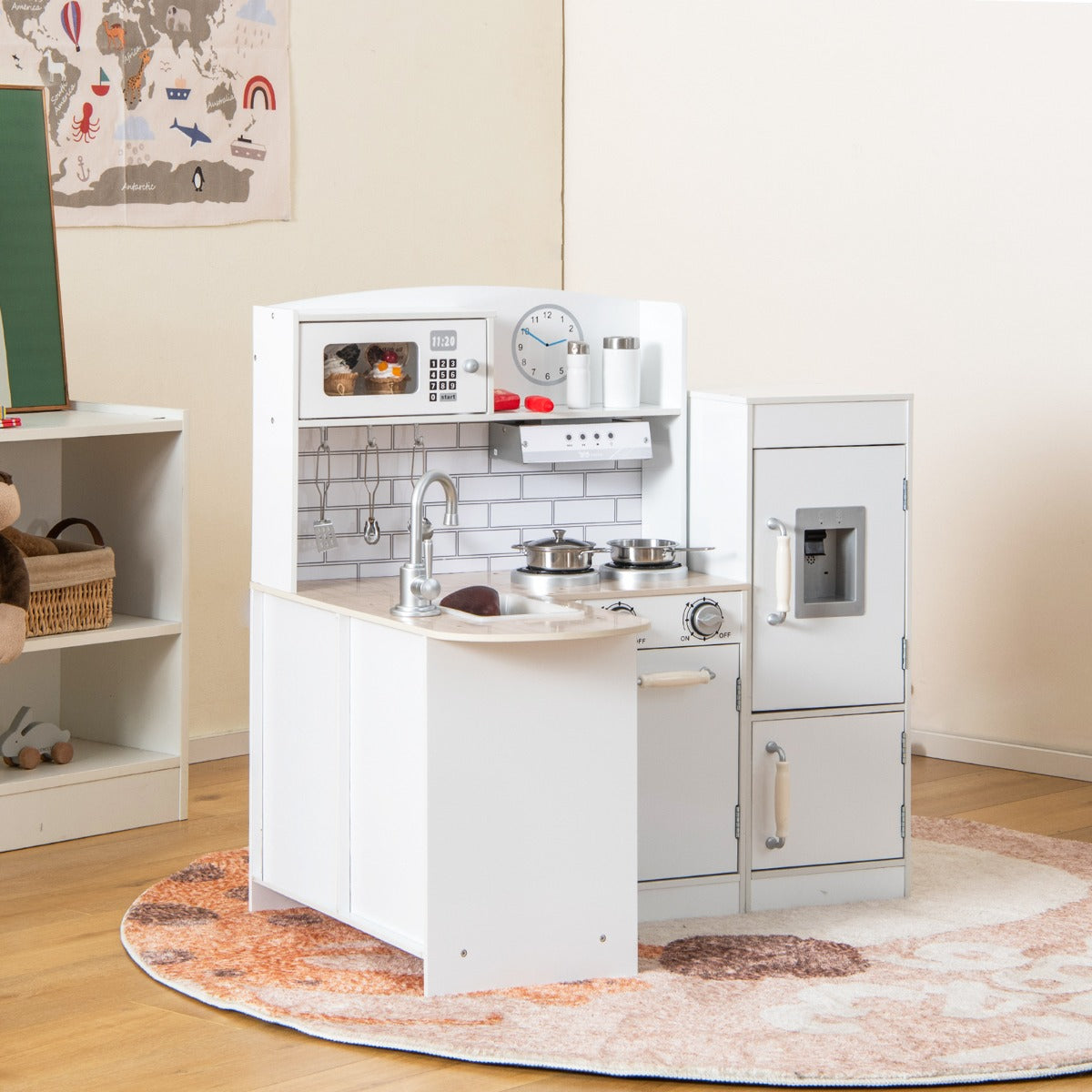 L-shaped kids play kitchen in white features a refrigerator, sink, and ample counter space for imaginative cooking...