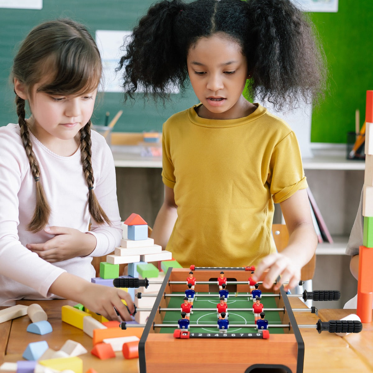 Mini tabletop foosball soccer game for kids, portable and perfect for game room entertainment.