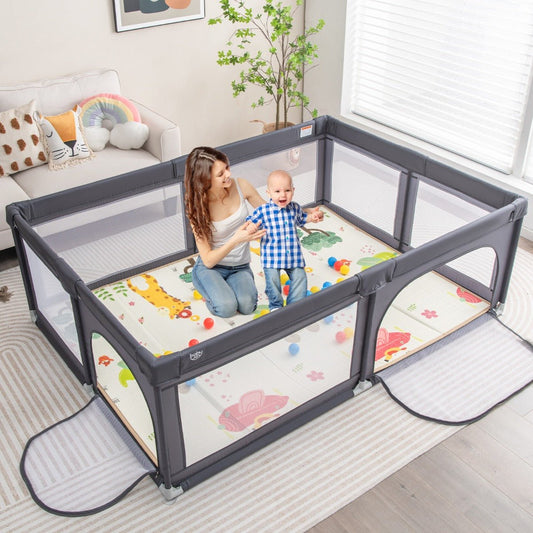 Compact dark grey playpen with mat and ocean balls, creating a safe play area for kids.