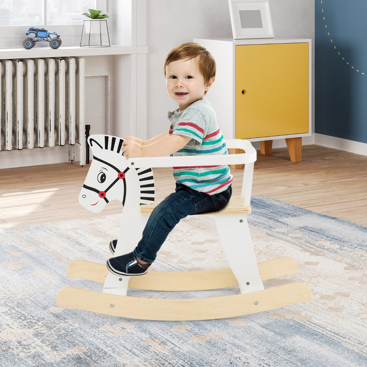 White wooden rocking horse with safety features for kids playroom, timeless and safe design.